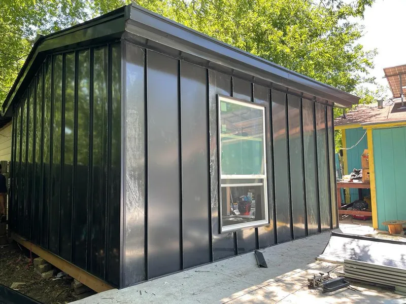 Black standing seam metal wall panels for Metal Roof Installation in Dyer